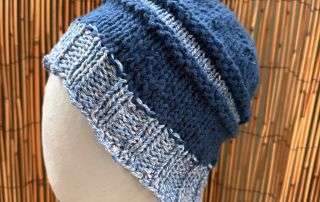 Our blue and white handknitted beanie styled and ready, a little bit witchy, a lot bit cosy.