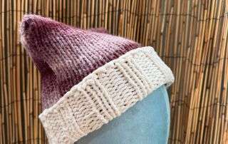Back view showing off the pointed ear on this handknitted cat ear beanie, a Pixel Witch favourite.