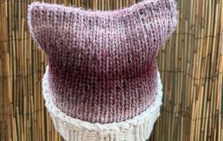Back view showing off the pointed ear on this handknitted cat ear beanie, a Pixel Witch favourite.