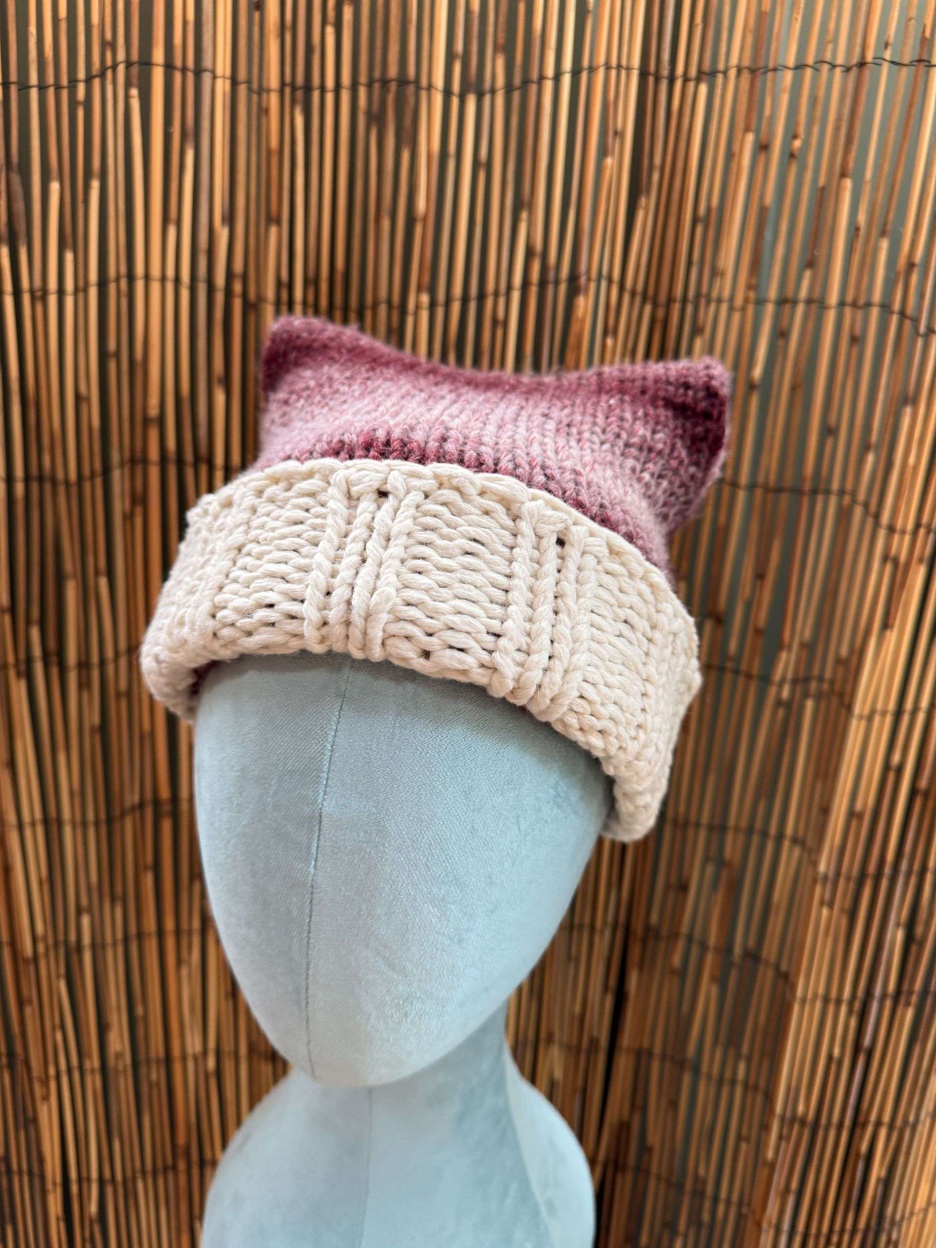 A perky little ear peeking up on this cat ear beanie, handmade knitwear with just the right amount of whimsy.
