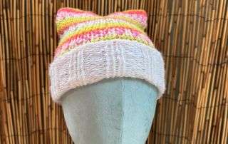 Front view of our striped cat ear beanie, handmade knitwear with ears made for double takes.